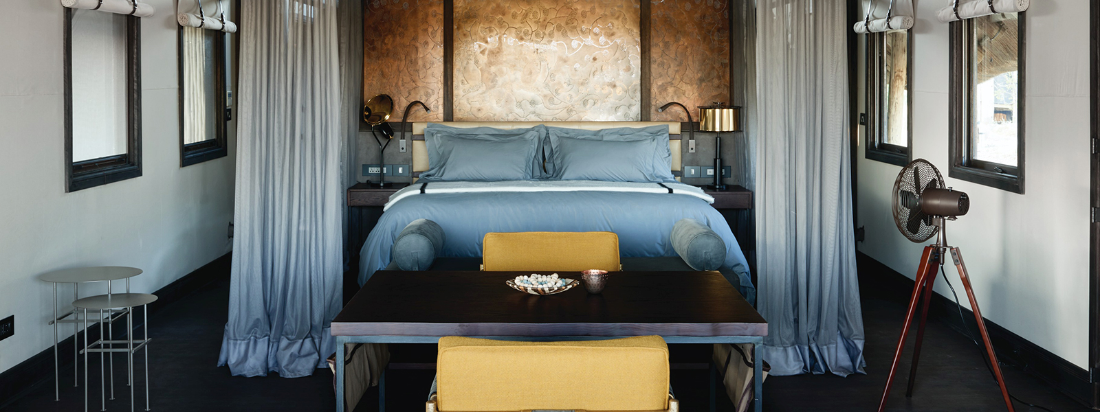 Eagle Island Lodge has air conditioned spacious tented rooms with enormous beds