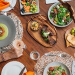 Colorful gourmet lunch spread featuring fresh, locally inspired dishes at Chitabe Camp in the Okavango Delta, Botswana