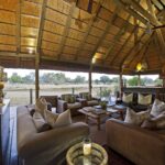 The lounge at Chitabe has a vantage point over the lediba waterhole