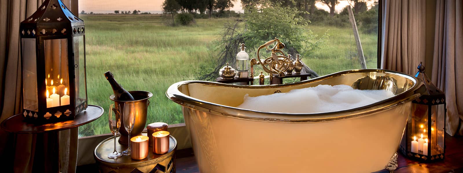 Stunning copper bathtubs at Dube Plains Camp