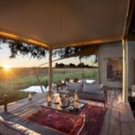 Sunset from private guest room deck at Duba Plains