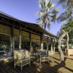 Open wooden deck area at Little Tubu Camp