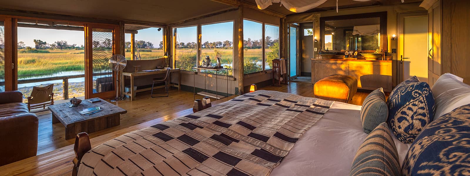 The six luxury tented rooms at Little Vumbura lie hidden in a forest in the Okavango Delta
