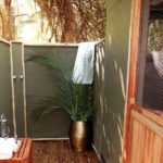 Tastefully decorated outside bathroom at Setari Camp