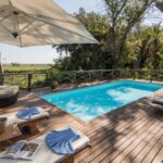 Shaded swimming pool and sun loungers delight guests with its perfect setting