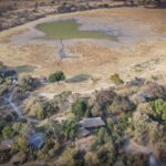 Drone view of Splash Camp and surrounding Okavango Delta floodplains.
