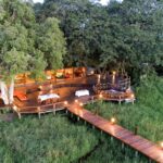 Main area at Mapula Lodge with wooden walkway leading off it