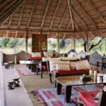 African styled furniture in the main lounge area at Camp Kalahari