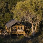 The spacious guest tents at Sable Alley with African styled decor
