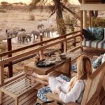 Savute Elephant Lodge guest put their feet up and relax after a full day on safari