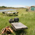 Setting up camp along the river with Bush Ways Safaris
