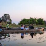 A Bush Ways mokoro excursion in calm Okavango waters