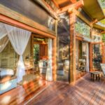 Intimate guest safari tent and deck at Camp Okavango