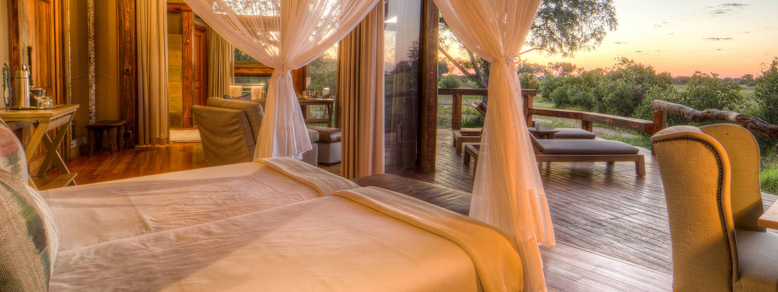 Delta view and private deck seen from inside Camp Okavango tent