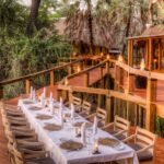 Dining outdoors on the deck at Camp Okavango
