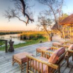 Relaxing sun loungers on the main deck at Camp Xakanaka