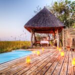 he beautifully located rim flow pool deck at Camp Xakanaxa