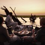Sunset on the water on boating excursion from Chobe Chilwero