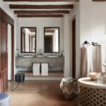 The luxurious en suite bathrooms at Chobe Chilwero offer all amenitie