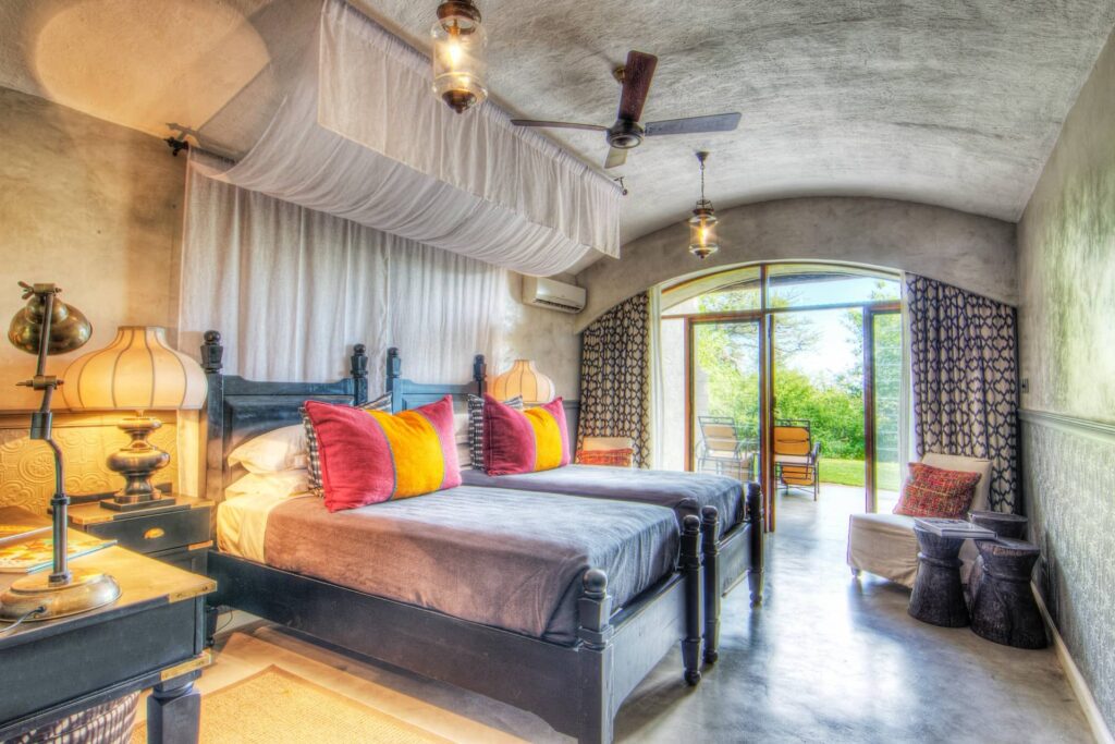 Colourful guest room interior at Chobe Game Lodge