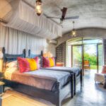 Colourful guest room interior at Chobe Game Lodge