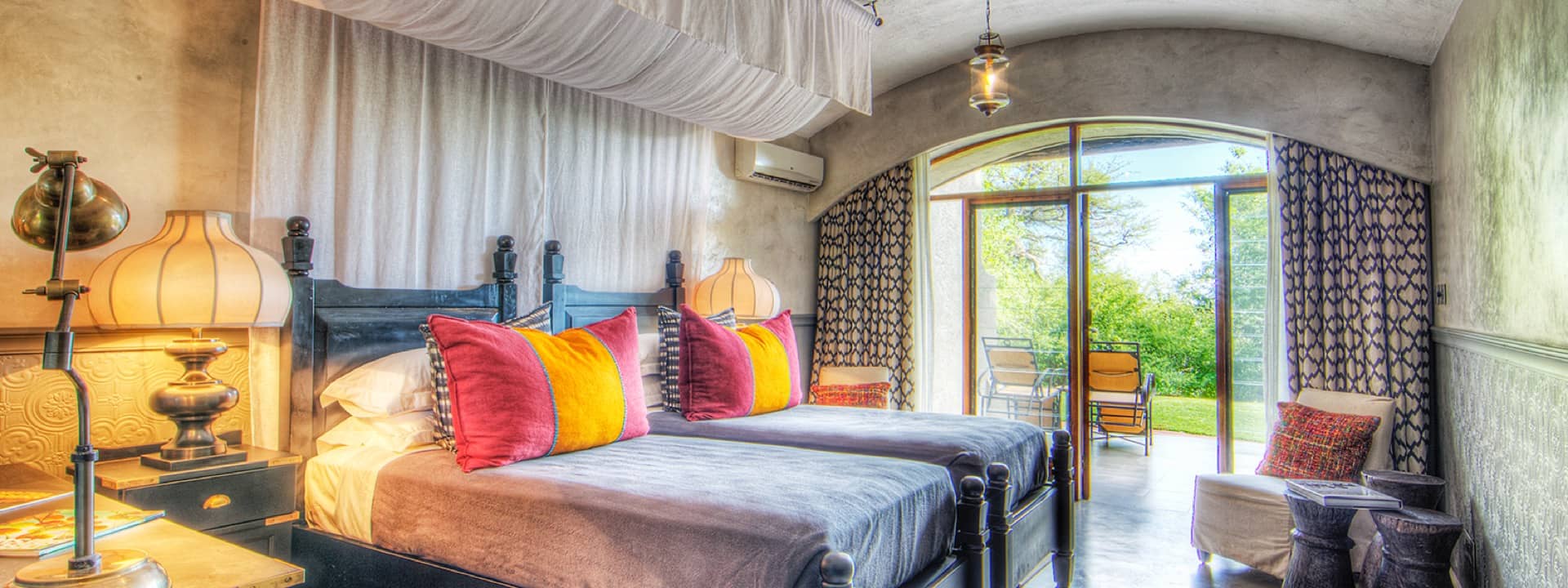 Colourful guest room interior at Chobe Game Lodge