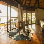 Peek at Chobe Savanna's spacious guest room interior and private deck
