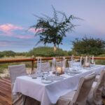 Dining on the deck with view at Dinaka Camp