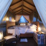 The welcoming upstairs pool suite day bed at Feline Fields Lodge