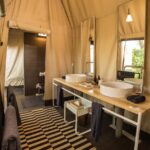 Gomoti Plains twin basins in en suite guest bathroom