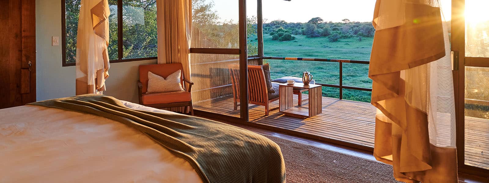 The spectacular sunrise from the guest rooms at Leroo la Tau