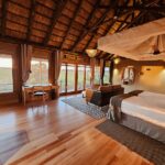 Renovated guest tent at Kanana Camp overlooking the vast floodplains of the Okavango Delta, Botswana.