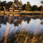 Kings Pool lodge seen from the other side of the lagoon