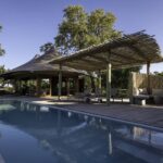 View of gym area and swimming pool at Mombo Camp