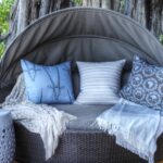 A cosy swimming pool lounger at Okuti Camp