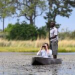 Mokoro guide on trip with Qorokwe Camp guests