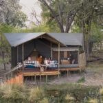 The guest tents at Shinde Footsteps feature a private deck to relax and enjoy the Okavango views