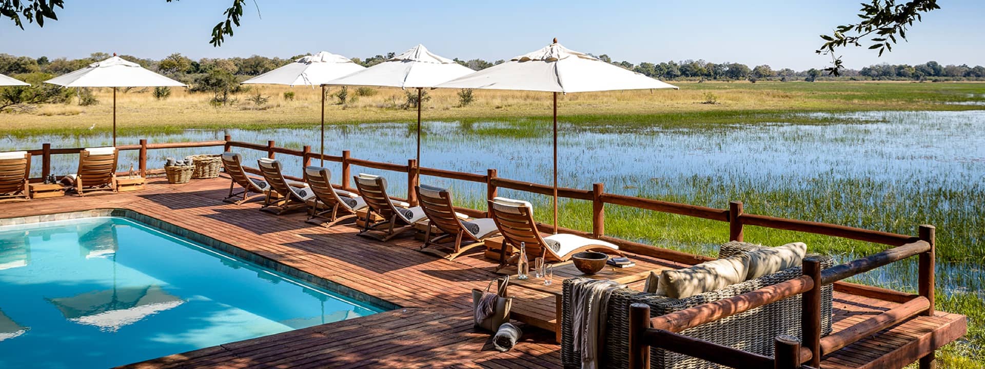 Chief's swimming pool and shaded sun loungers shade with a magnificent view