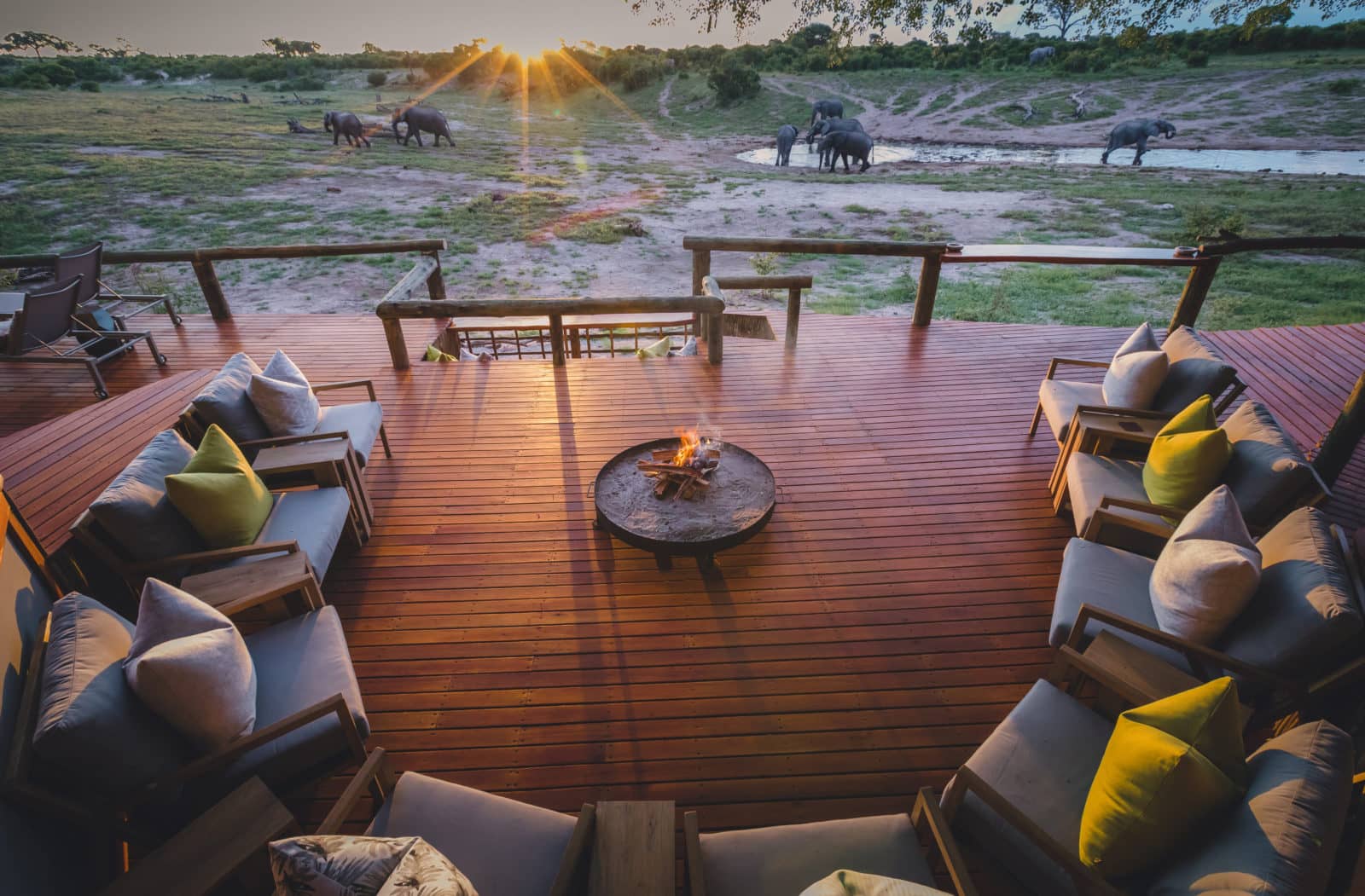 Savute Safari Lodge's wooden deck and firepit are a focal point and perfect setting for pre-dinner drinks