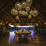Elegant dining room table setting on deck at Savuti