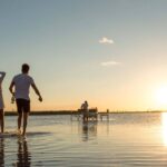 Sundowner drinks on the flooded pans at Jacks Camp