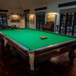 Enjoy various classic games like billiards at The River Club