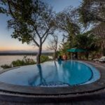 The River Clubs flow rim swimming pool overlooking the Zambezi River
