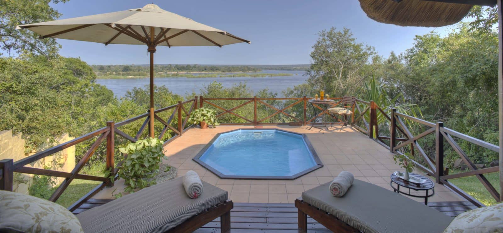 Luxury River Suite with private deck and pool at The River Club