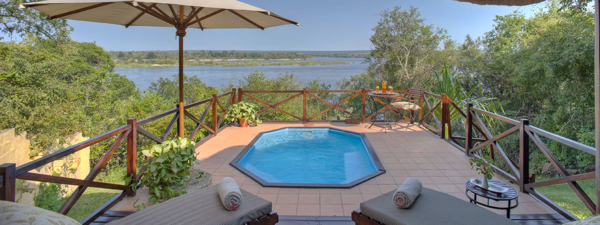 Luxury River Suite with private deck and pool at The River Club