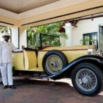 A Rolls Royce completes the colonial atmosphere at The River Club