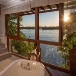 Bathroom with a view at The River Club