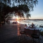 Dining at the main lodge at Tongabezi