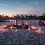 Sandbar sundowners are a romantic way to end the day at Tongabezi
