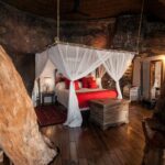 The Treehouse bedroom is built into the trees at Tongabezi